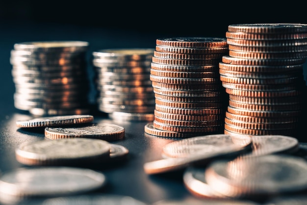 Pile of gold coins stack in finance treasury deposit bank account for saving