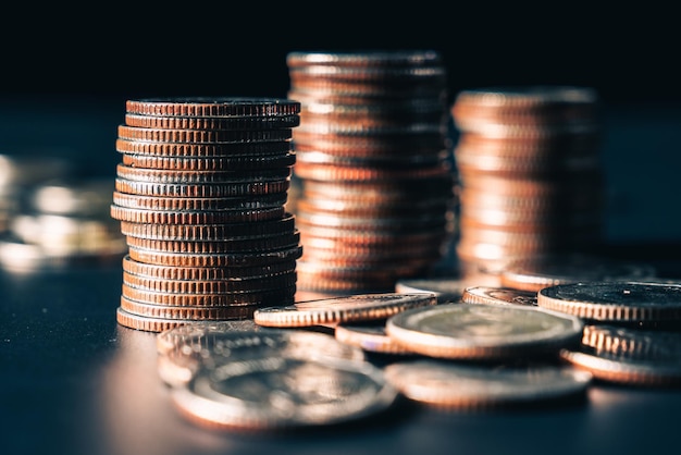 Pile of gold coins stack in finance treasury deposit bank account for saving