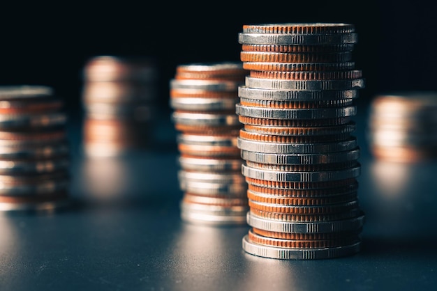 Pile of gold coins stack in finance treasury deposit bank account for saving