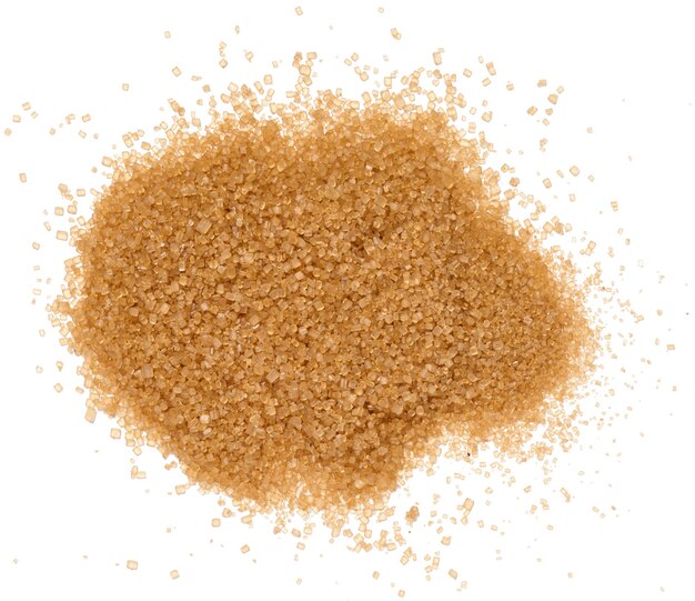 A pile of granulated brown cane sugar top view