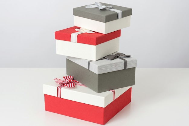 Photo pile of grey and red gift boxes