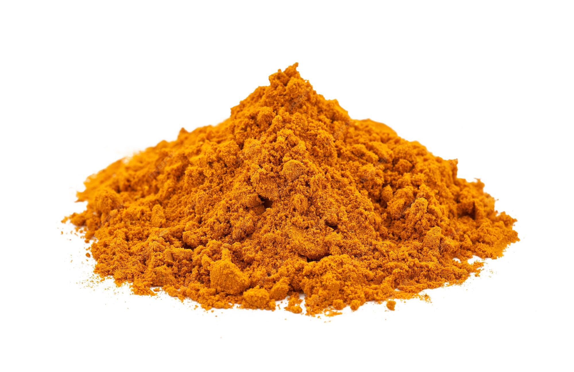 Premium Photo A pile of ground turmeric powder or curcumin powder
