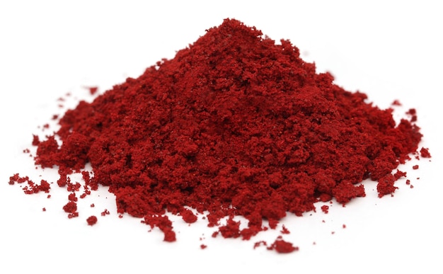 Pile of Industrial red color over white background