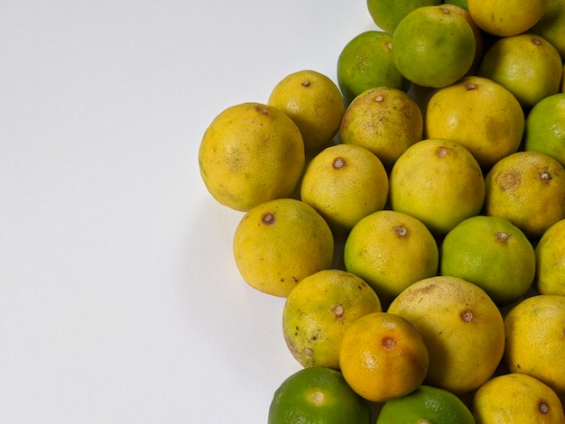 A pile of limes on isolated background