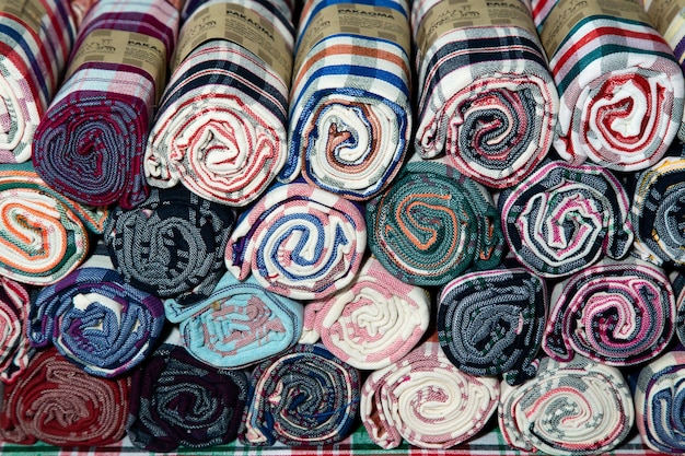 Pile of Loincloth fabric Thailand silk. Thai loincloth roll for sale at the market in thailand