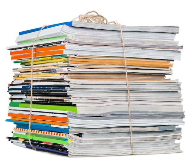 Pile of magazines on white background