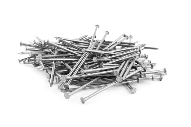 Pile of metal nails on white background