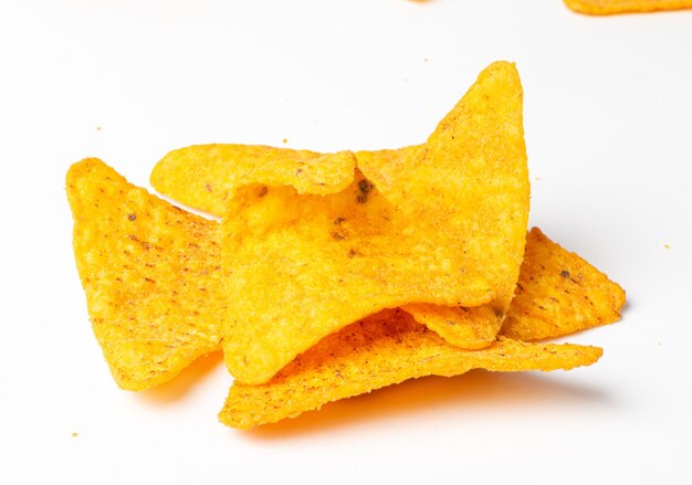 A pile of nachos on a white background