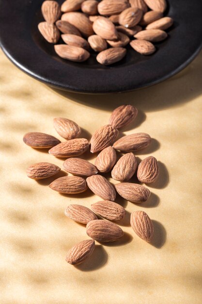 Pile of natural almonds Prunus dulcis closeup image