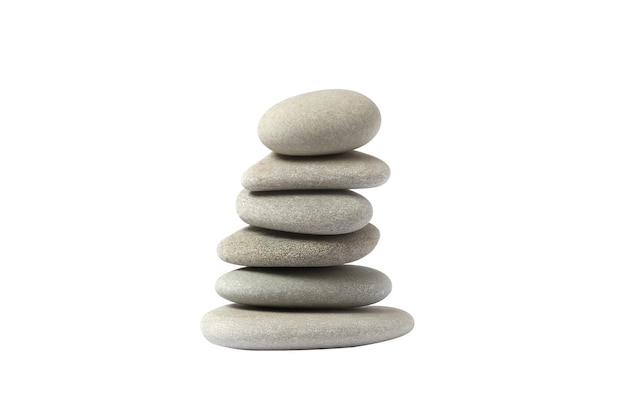 A pile of natural stones on top of each other is insulated on a white background. The State of Zen. High quality photo