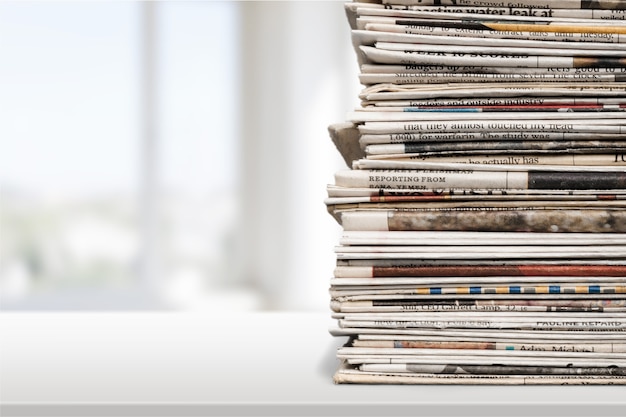 Pile of newspapers , close up