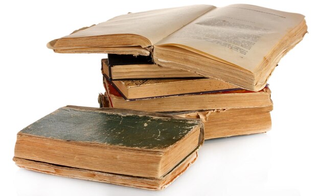 Pile of old books isolated on white