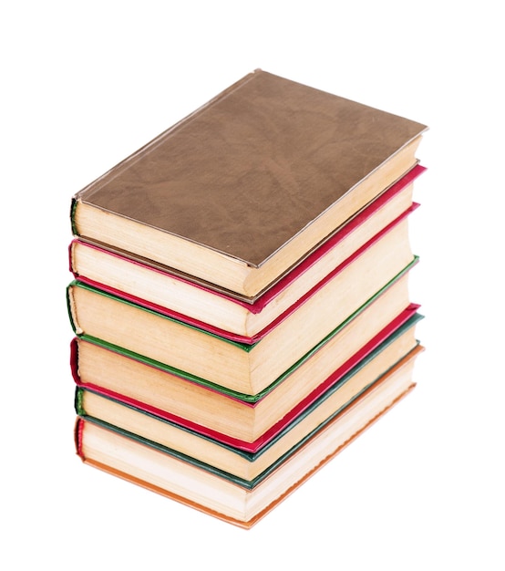 Pile of old dirty books on a white background