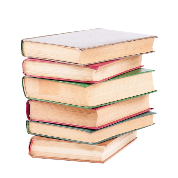 Photo pile of old dirty books on a white background