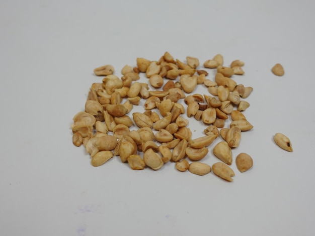 a pile of peanuts with the letter f on it