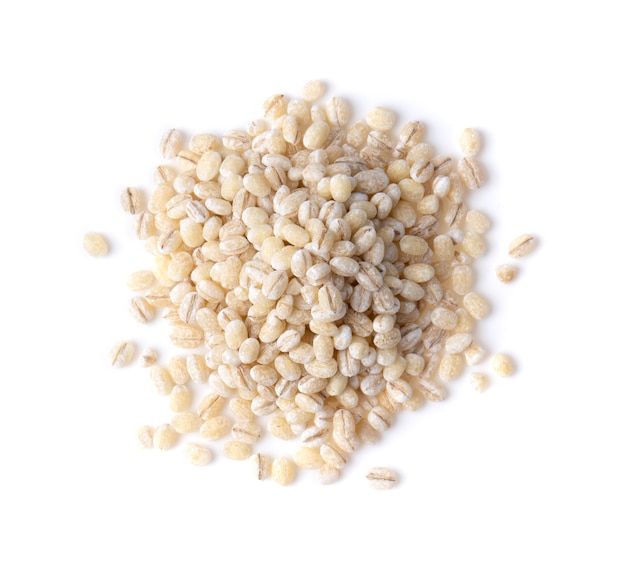 Pile of pearl barley isolated on white background