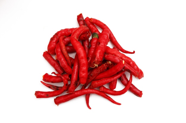 Pile of peeled Red Chili on a white background