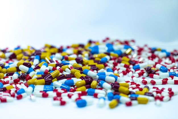 A pile of pills on a white surface