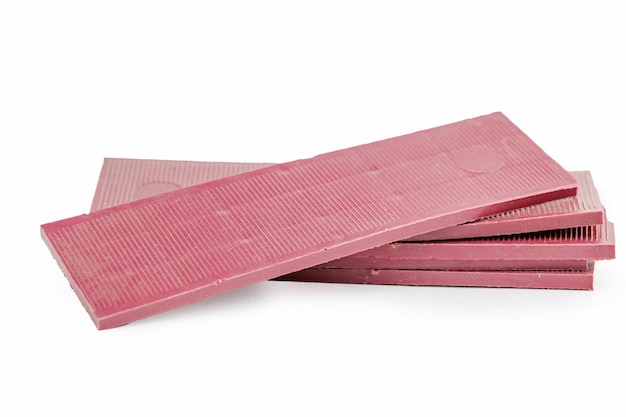 Pile of pink plastic panels Materials concept