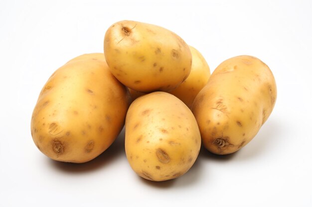 a pile of potatoes on a white surface