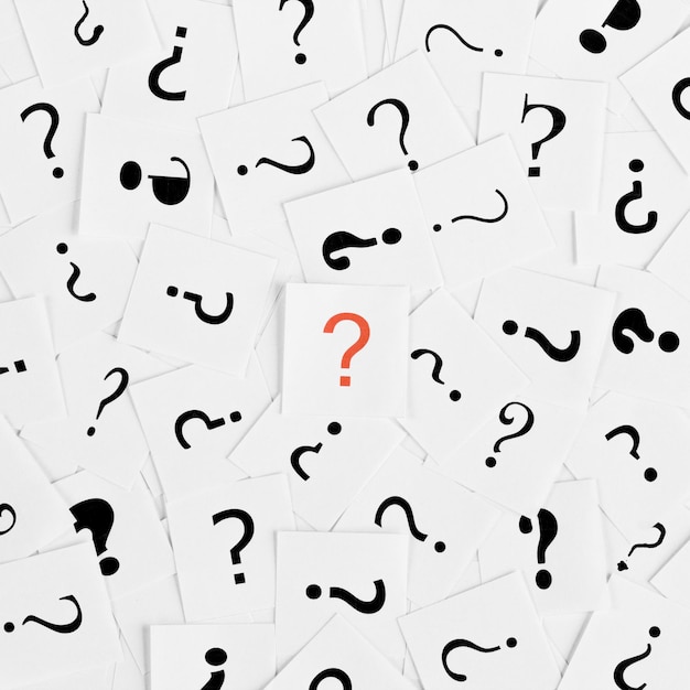 Pile of question mark signs scattered around