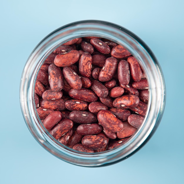 Pile of raw beans in glass bowl