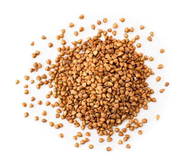 Pile of raw buckwheat on a white background, isolated