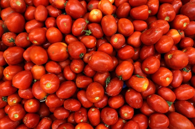 a pile of red peppers with the word " on the top.