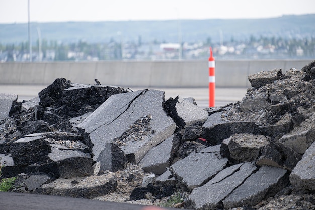 Photo pile of removed road ashphalt roemved from road