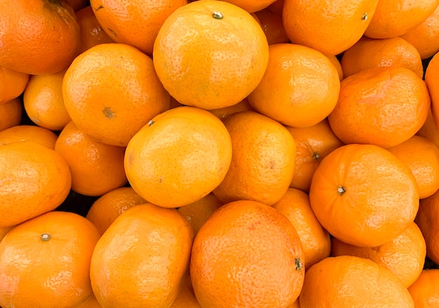 A pile of ripe oranges in the supermarket