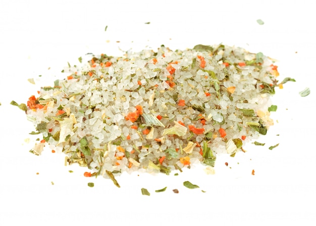 Pile of sea salt and a mixture of spices isolated on white.