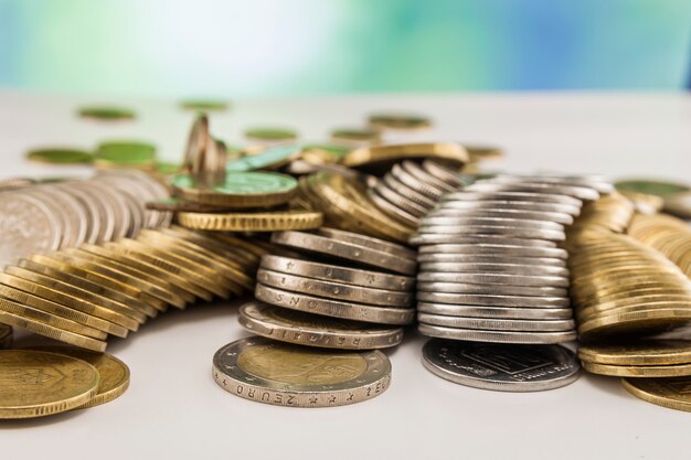 Pile of shiny coins of different sizes