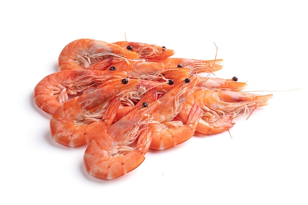 Pile of shrimps cut out on a white wall