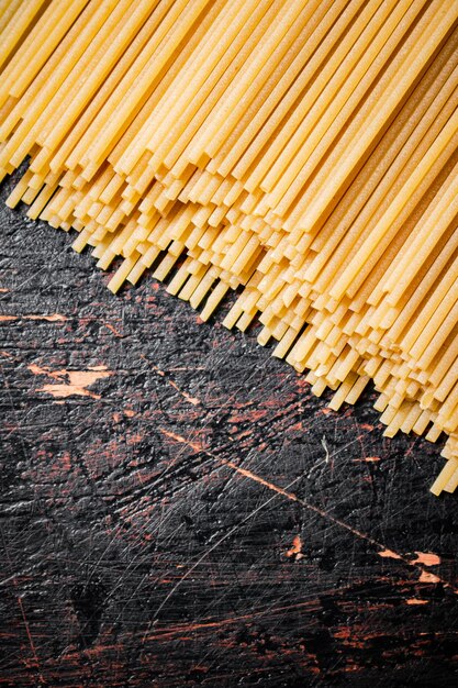 A pile of spaghetti dry on the table