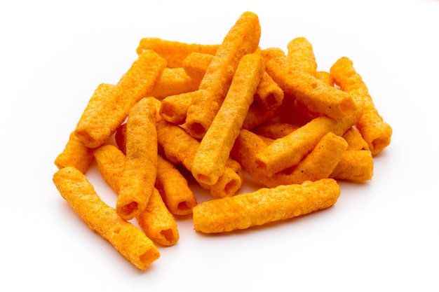 Photo pile of sweet potato or yam fries isolated on white background.