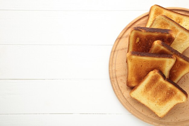 Pile of toasted bread slices. Top view