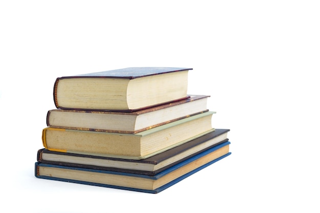 Photo pile of used books isolated on white background world book day