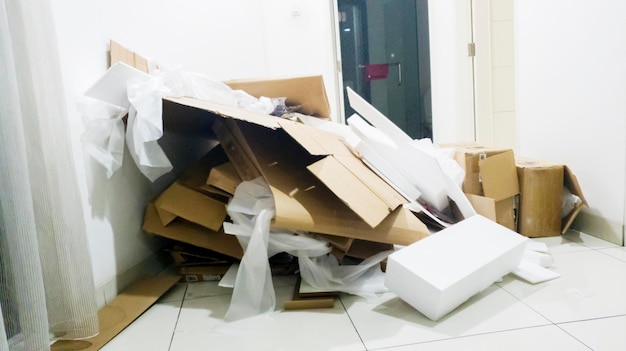 Pile of used cardboard and styrofoam waste