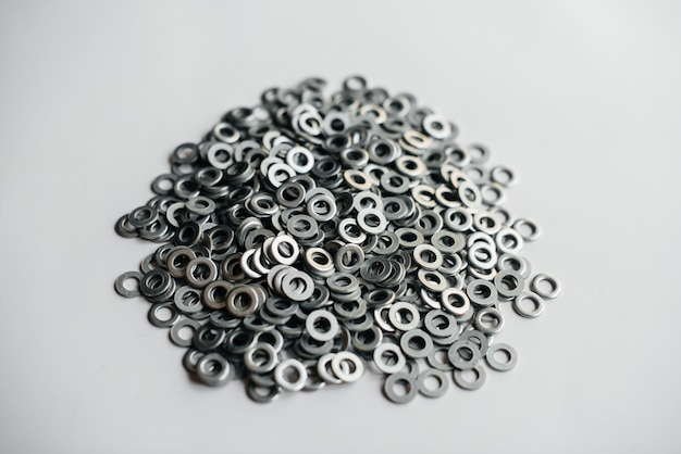 Pile of washers, bolts and nuts close-up