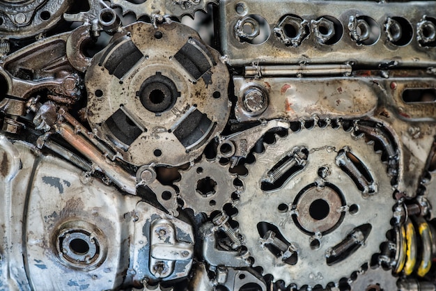 Photo a pile of welded gears. macro view