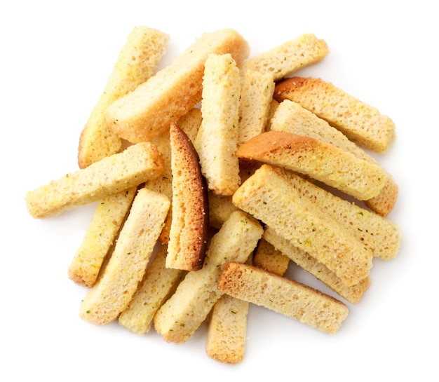 Pile of wheat crackers on white