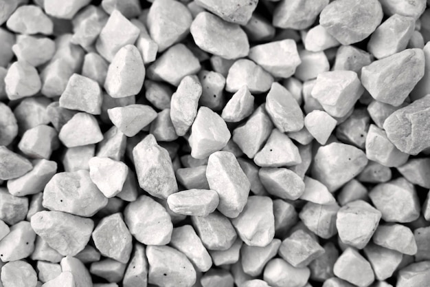 Pile of white gravel in blur. the texture of the stone. rubble\
texture