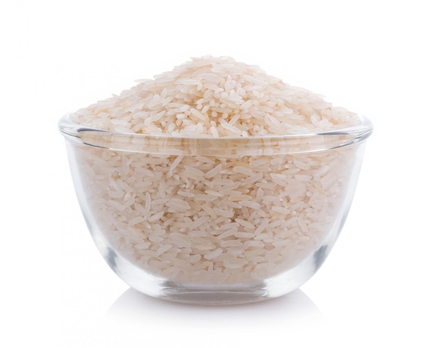 Pile of white rice in bowl on white background