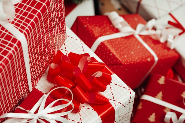 Pile of wrapped presents under the Christmas tree