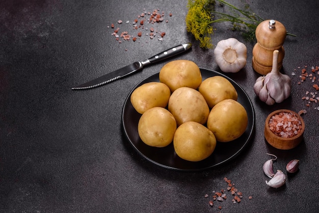 A pile of young potatoes on the table The benefits of vegetables