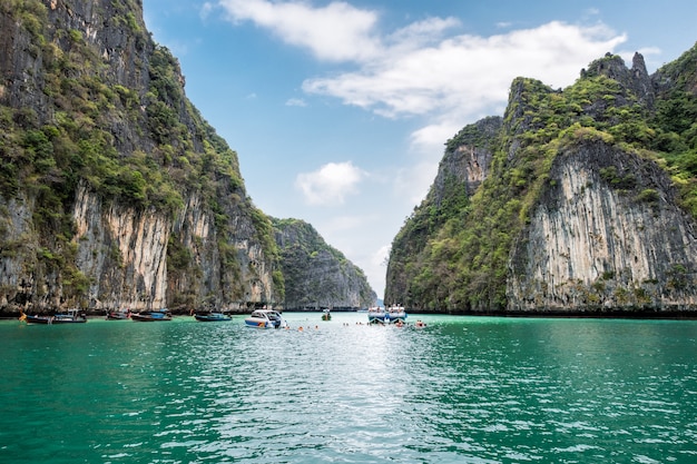 Pileh lagoon limestone mountain surrounded and emerald sea with tourists traveling at Krabi