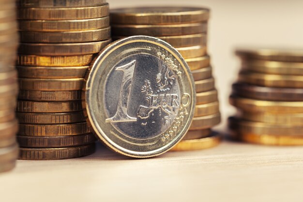 Piles of coins on working table