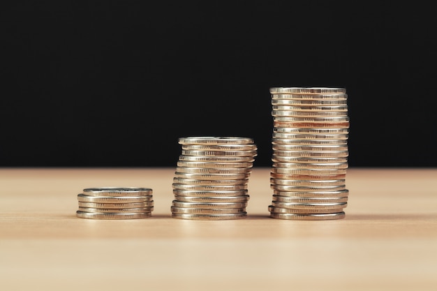 Piles of coins on working table