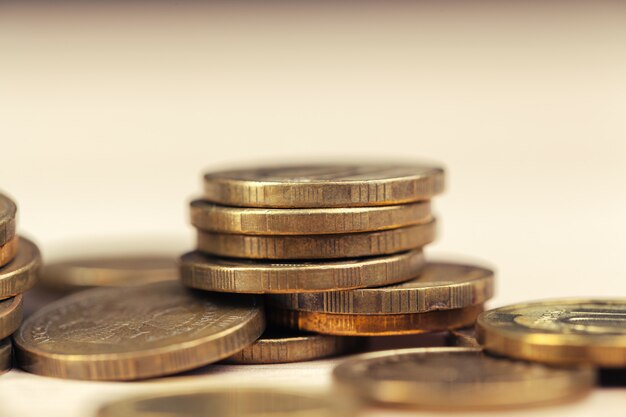 piles of coins on working table