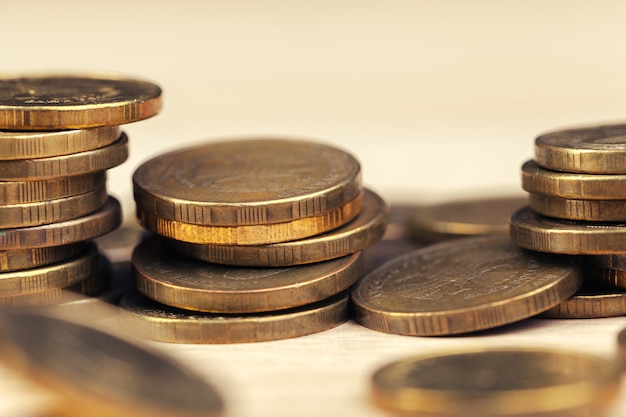 piles of coins on working table